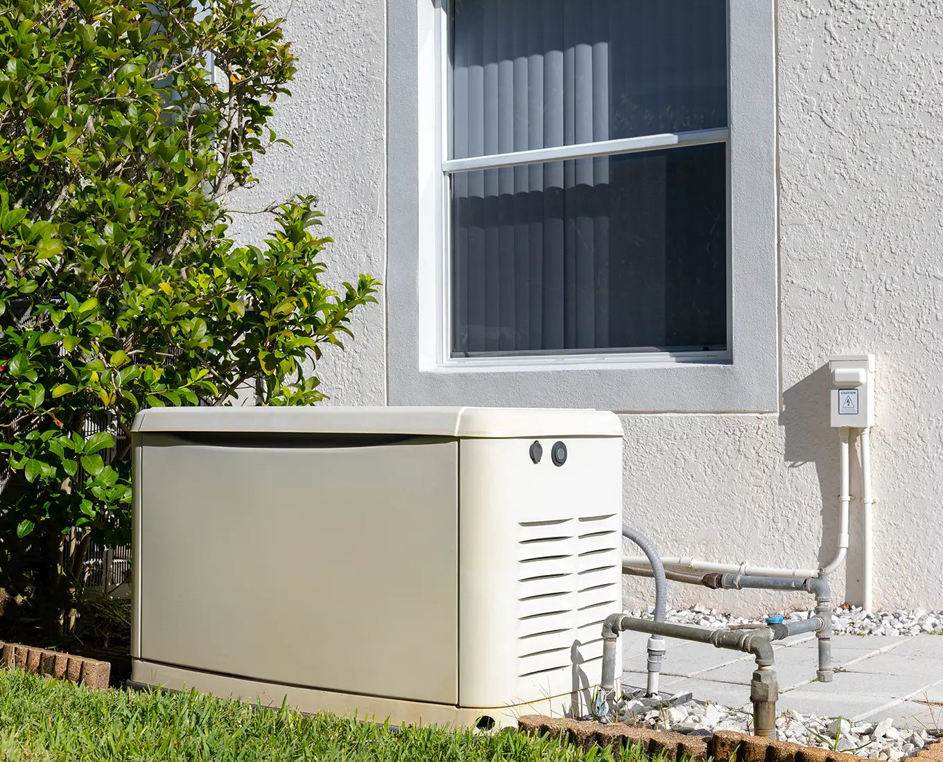 Standby home generator installed outside a Granite City, IL residence for backup power during outages.
